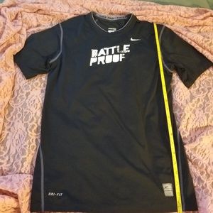 black Nike pro Kids shirt.